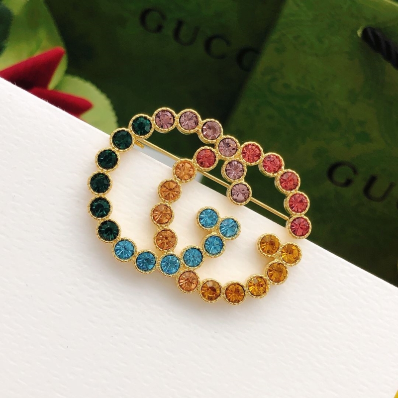 Gvc*1 brooches